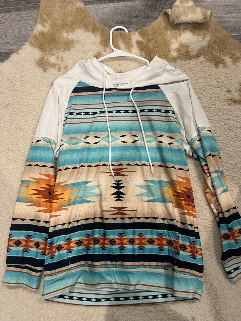 Western top with hoodie. Aztec print.